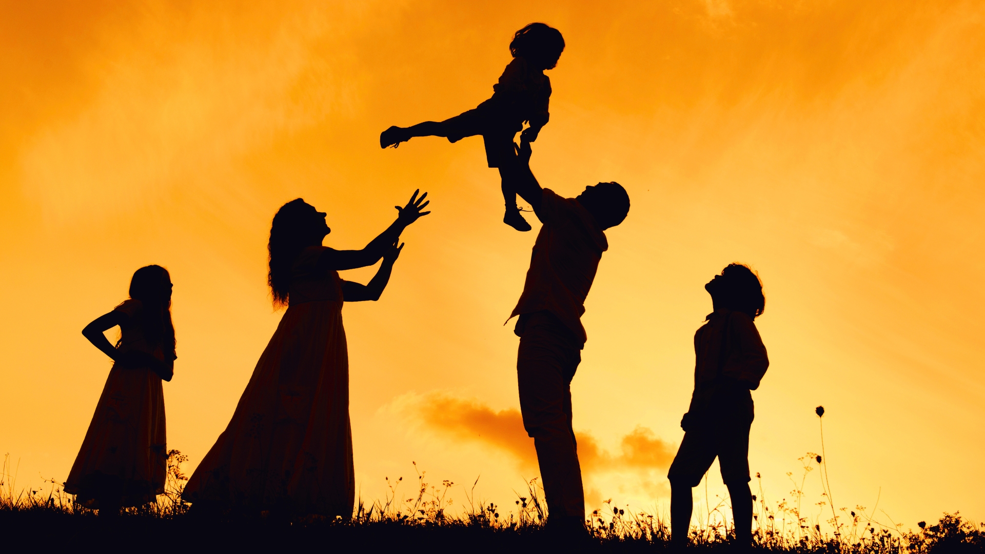 family in silhouette