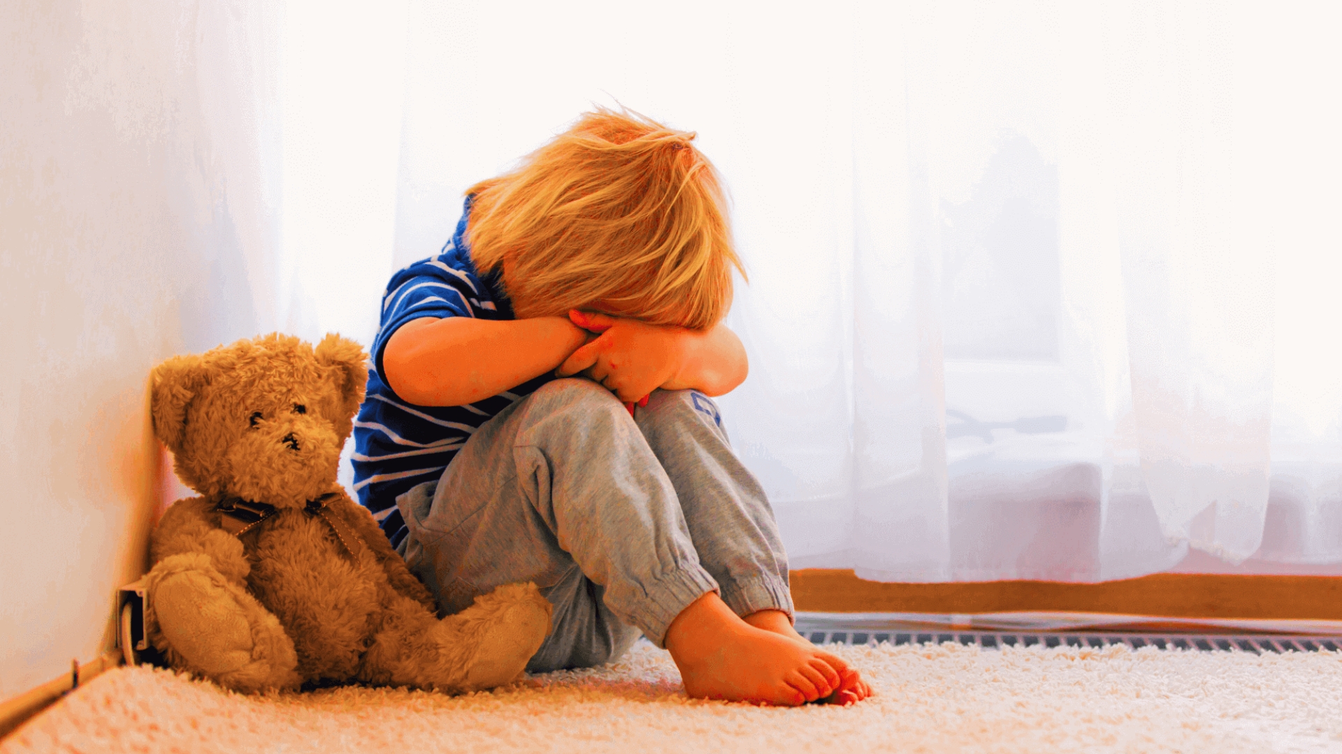 Child with teddy bear